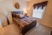 Thumbnail 9 of 18 - Bedroom with cozy bed at Pinehurst Condominiums Apartments ,Las Vegas,89118