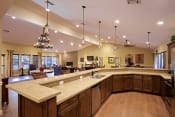 Thumbnail 8 of 33 - Clubhouse with Graceful Kitchen Area at Sky Court Harbors at The Lakes Apartments, Las Vegas, NV, 89117