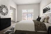 Thumbnail 9 of 40 - a bedroom with a large bed and a window at Aston at Cinco Ranch, Katy, TX, 77450