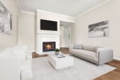 Thumbnail 9 of 28 - a living room with a couch and a fireplace at Villages of Cypress Creek, Houston, 77070