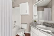 Thumbnail 5 of 28 - a bathroom with a sink toilet and a bath tub at Villages of Cypress Creek, Houston, TX, 77070