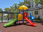 Thumbnail 18 of 22 - outdoor play ground | District West Gables Apartments in West Miami, Florida