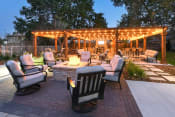 Thumbnail 13 of 17 - a patio with chairs and a fire pit at Verdant, Boulder, 80303