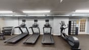 Thumbnail 22 of 36 - fitness center with cardio machines at 2800 woodley apartments in washington dc