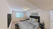 Thumbnail 9 of 22 - bedroom with bed, nightstands, large windows and tv at cambridge square apartments in bethesda md
