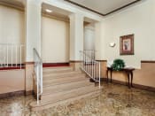 Thumbnail 10 of 17 - lobby lounge with stairs to apartment homes at 2801 Pennsylvania apartments in washington dc
