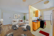 Thumbnail 3 of 16 - living area, dining area and kitchen at garden village apartments in congress heights washington dc