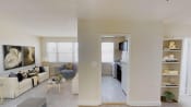 Thumbnail 4 of 16 - living area with sofa, coffee table, credenza, plush carpeting, and large windows at jetu apartments in washington dc