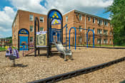Thumbnail 7 of 16 - playground with jungle gym at jetu apartments in washington dc