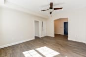 Thumbnail 4 of 26 - vacant living area with wood flooring and ceiling fan at petworth station apartments in washington dc