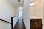 Thumbnail 7 of 16 - upstairs hallway with view of bathroom at sheridan station south townhomes in washington dc