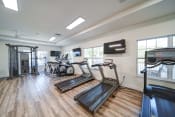 Thumbnail 30 of 47 - community fitness center with treadmills and workout equipment