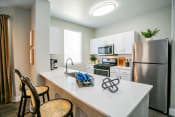 Thumbnail 11 of 32 - Octave Apartments Kitchen with stainless steel appliances