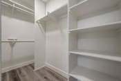 Thumbnail 46 of 48 - the closet in a bedroom with white shelves at Monterra Ridge Apartments, California,91351