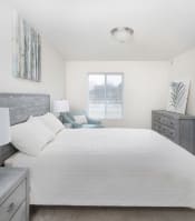 Thumbnail 2 of 20 - Sunlit Bedroom at Alger Apartments, Grayling, MI