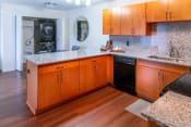Thumbnail 5 of 13 - Fully Furnished Kitchen at Miles Apartments, Fort Gratiot Twp, MI