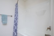 Thumbnail 22 of 43 - Bathroom Shower  at Walker Estates Apartments, Augusta, GA, 30906