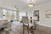 Thumbnail 6 of 48 - Dining area and living room at V on Broadway Apartments in Tempe AZ November 2020 (2)