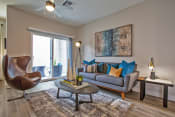 Thumbnail 8 of 44 - Living room at Senderos at South Mountain in Phoenix AZ September 2020