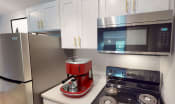 Thumbnail 6 of 41 - Brixin Franklin Apartments & Townhomes Renovated Kitchen