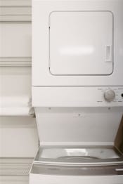 Thumbnail 36 of 43 - a white washer and dryer in a room