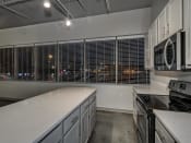 Thumbnail 27 of 41 - Kitchens With High-Quality Countertops at The Tower Apartments, Alabama