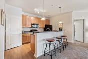 Thumbnail 9 of 50 - Kitchen Island with Dining space at Tapestry Park, Chesapeake, VA