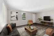 Thumbnail 7 of 25 - spacious living room  Living Room with wood flooring at Midtown Oaks Townhomes in Mobile, AL