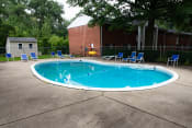 Thumbnail 4 of 14 - Welcoming pool in a wooded setting at Ryan Place Apartments, Integrity Realty, Ohio, 44240