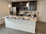 Thumbnail 7 of 19 - Large Island Kitchen at Reserve Overlook Apartments, Integrity Realty, Ohio, 44106