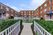 Thumbnail 8 of 10 - Our apartments showcase a beautiful courtyard at Highland Ridge, Capitol Heights, MD