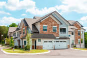 Thumbnail 23 of 24 - exterior building shot with attached garages at Creekside at Providence, Mt Juliet