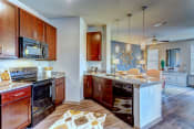 Thumbnail 10 of 24 - model kitchen overview at Creekside at Providence, Tennessee, 37122