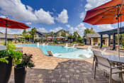 Thumbnail 27 of 29 - Pool seating and sun deck at Avenues at Shadow Creek Ranch, Pearland, TX, 77584