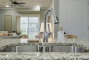 Thumbnail 2 of 46 - Stainless Steel Sink With Faucet In Kitchen at Prairie Pines Townhomes, Shawnee, KS, 66226
