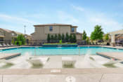 Thumbnail 37 of 46 - Swimming Pool With Relaxing Sundecks at Prairie Pines Townhomes, Shawnee
