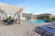 Thumbnail 34 of 46 - Poolside Relaxing Area at Prairie Pines Townhomes, Shawnee, KS