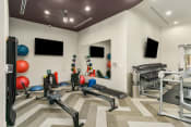 Thumbnail 6 of 49 - Fitness Center With Yoga/Stretch Area at Discovery at Kingwood, Kingwood, TX, 77339