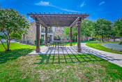 Thumbnail 72 of 94 - a patio with a picnic table and a pergola at Discovery at Craig Ranch, McKinney, Texas