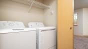 Thumbnail 37 of 39 - a washer and dryer in a laundry room