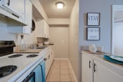 Thumbnail 7 of 13 - Fully Furnished Kitchen at South Park Apartments, Texas, 78221