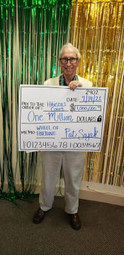 Thumbnail 30 of 68 - Senior Is Taking A Photo With A Cheque at Hibiscus Court, Florida, 32901