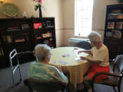 Thumbnail 51 of 68 - Seniors Engaged In A Activity at Hibiscus Court, Melbourne, Florida