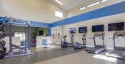 Thumbnail 14 of 20 - Temecula, CA Apartments for Rent - Vista Promenade Fitness Center with treadmills, ellipticals, free weights, and more