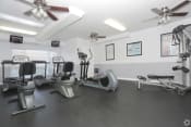 Thumbnail 18 of 18 - West Covina, CA Apartments - Tuscany Villas Fitness Center with Elliptical, Treadmills, Ceiling Fans, Large Window, and More