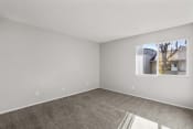 Thumbnail 13 of 35 - an empty bedroom with a large window at Aspire Rialto, California