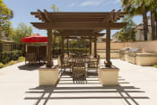 Thumbnail 10 of 36 - a patio with a pergola