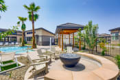 Thumbnail 33 of 38 - our apartments have a pool and lounge area with chairs and a fire pit  at Grandstone at Sunrise, Peoria, 85383