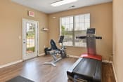 Thumbnail 24 of 44 - Fitness room with treadmills and bikes at The Reserves of Thomas Glen, Shepherdsville, KY, 40165