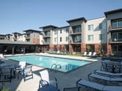 Thumbnail 23 of 33 - Swimming Pool And Sundeck at Foothill Lofts Apartments & Townhomes, Logan, 84341